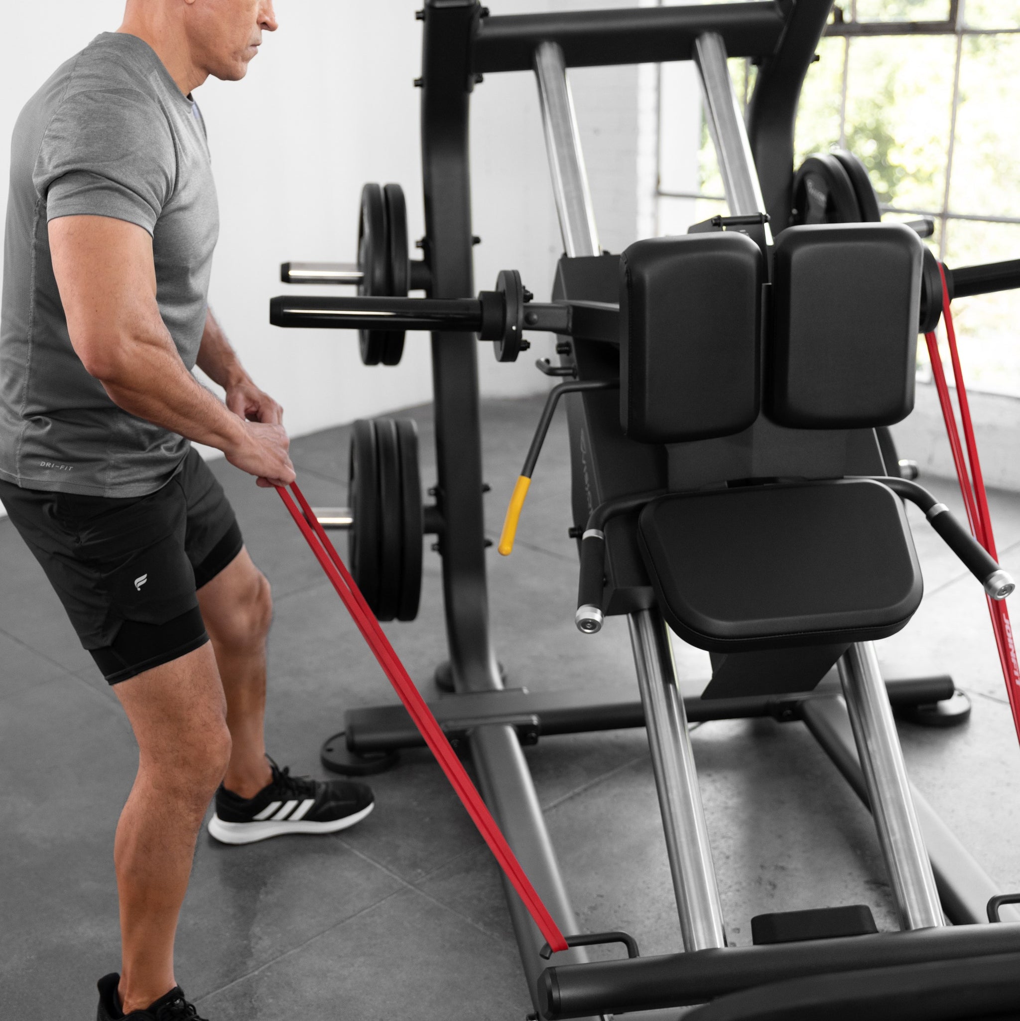 Hack Squat Plate Load - Vision Fitness mit Aufhängung für Widerstandsbandtraining
